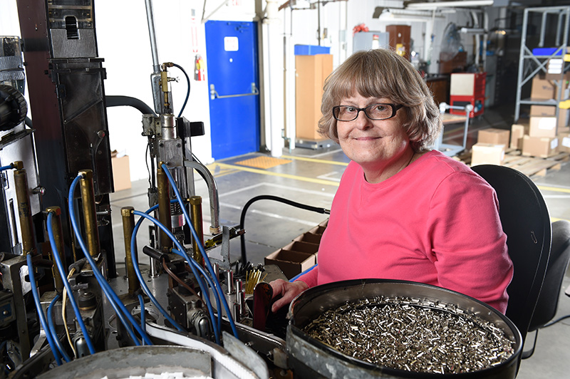 Lynn Larsen a machine operator at Industires of the Blind